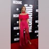 Rosie Huntington-Whiteley is a vision in pink! The model and actress walked the red carpet in a hot pink number that showed off her long legs.