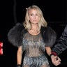 Hotel heiress Paris Hilton left little to the imagination when she decided to wear a see-through sparkling dress to attend the iHeartRadio after-party at West Hollywood's Delilah with beau Chris Zylka.