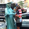 Farrah Abraham is giving Lady Liberty a run for her money. The reality star stopped a street performer in New York City's Rockefeller Center and tried on their outfit. Who do you think makes a better Staue of Liberty?