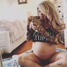 Jenna Jameson is ready to meet her "little bun" in the oven. The former porn star shared a revealing picture of her growing baby bump on Twitter saying, "Officially 27 weeks pregnant and feeling beautiful! [I'm] in the home stretch now... I can't wait to meet my little bun." Click here for more pics of the star on Hollywoodlife.com.