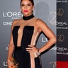 Can that be considered a dress? Eva Longoria showed a lot of skin in a barely-there black and sheer gown. The actress and producer donned the daring dress at the 20th Birthday Of L'Oreal In Cannes Gala during the 70th annual Cannes Film Festival. Click here for more pics of the star on X17online.com.