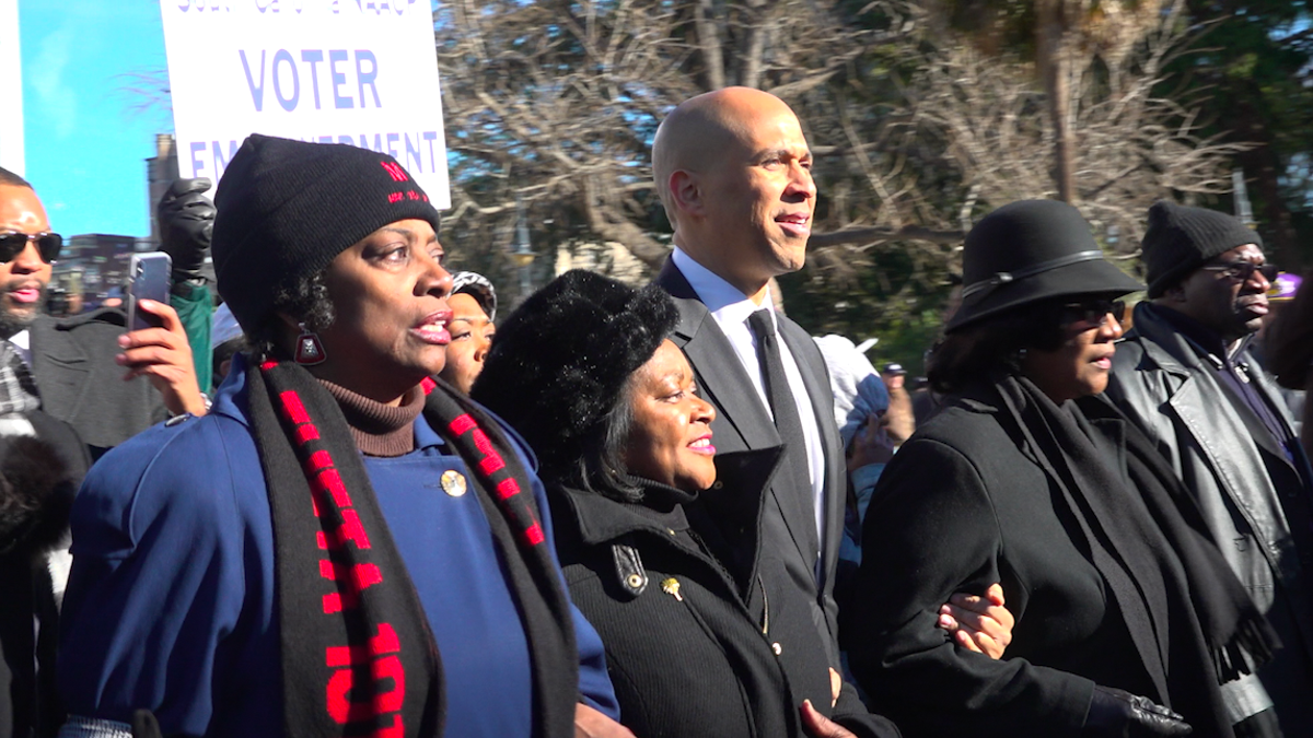 Sen. Cory Booker leads the march to South Carolina's State House on Martin Luther King Jr. Day.