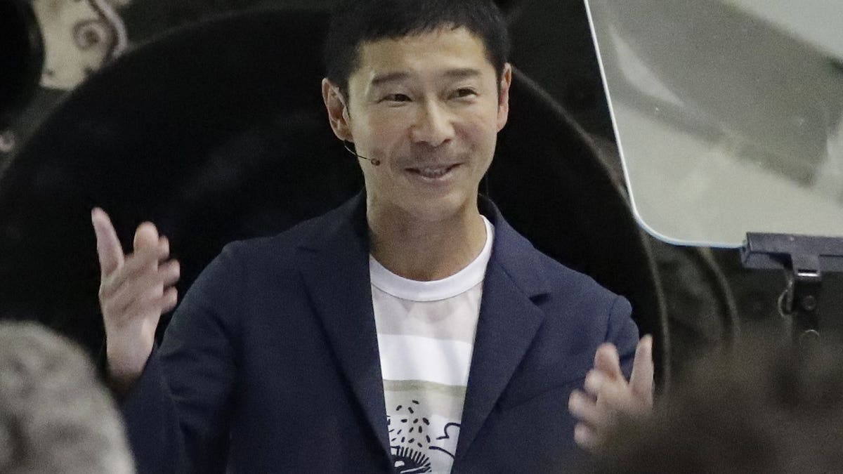 Japanese billionaire Yusaku Maezawa speaks after SpaceX founder and chief executive Elon Musk announced him as the person who would be the first private passenger on a trip around the moon, Monday, Sept. 17, 2018, in Hawthorne, Calif.