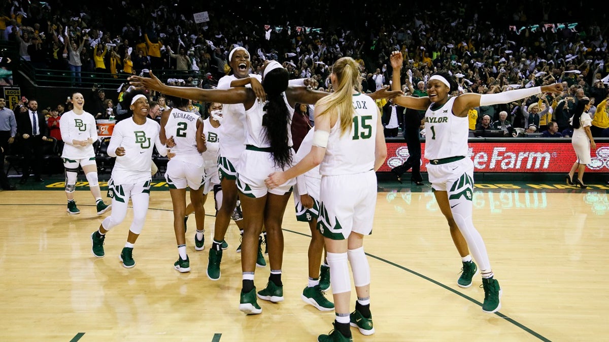 Baylor players celebrate after a 68-57 victory over No. 1 Connecticut in an NCAA college basketball game Thursday, Jan. 3, 2019, in Waco, Texas. (AP Photo/Ray Carlin)