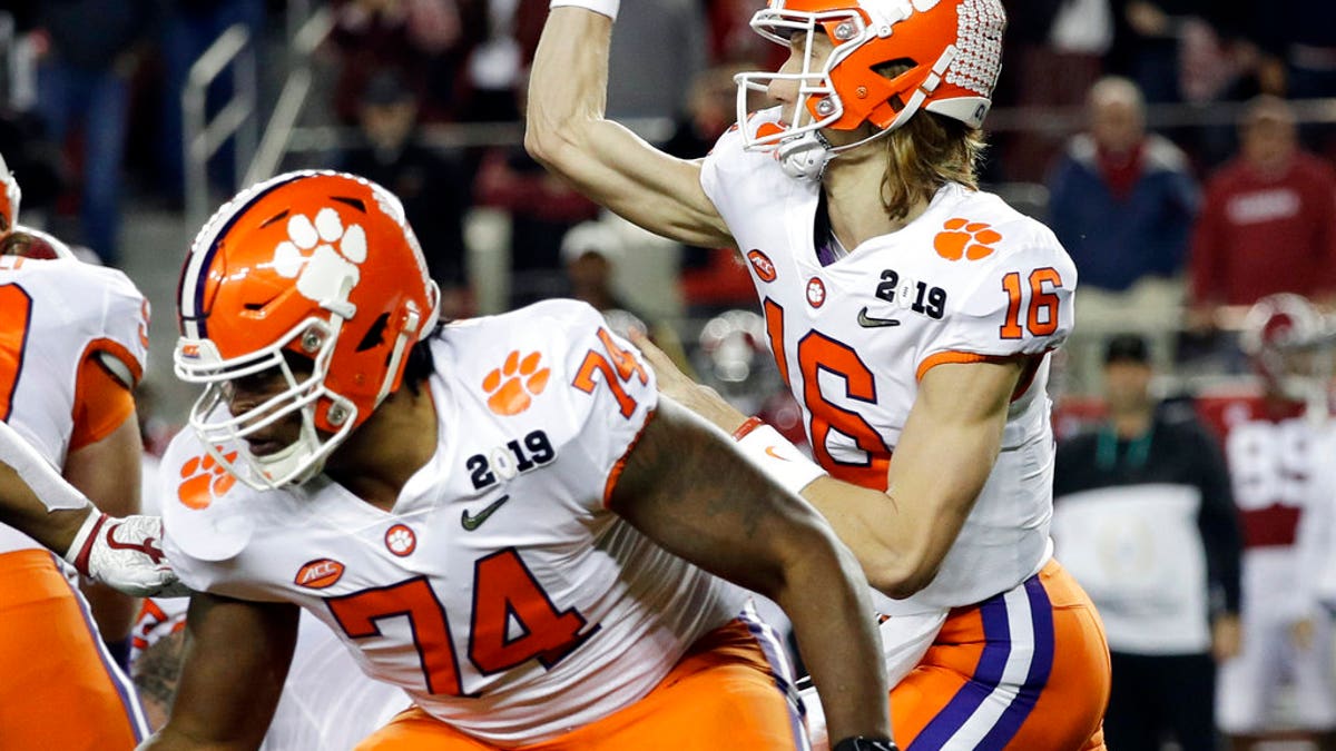 Clemson's Trevor Lawrence throws during the first half the NCAA college football playoff championship game against Alabama, Monday, Jan. 7, 2019, in Santa Clara, Calif. (AP Photo/David J. Phillip)