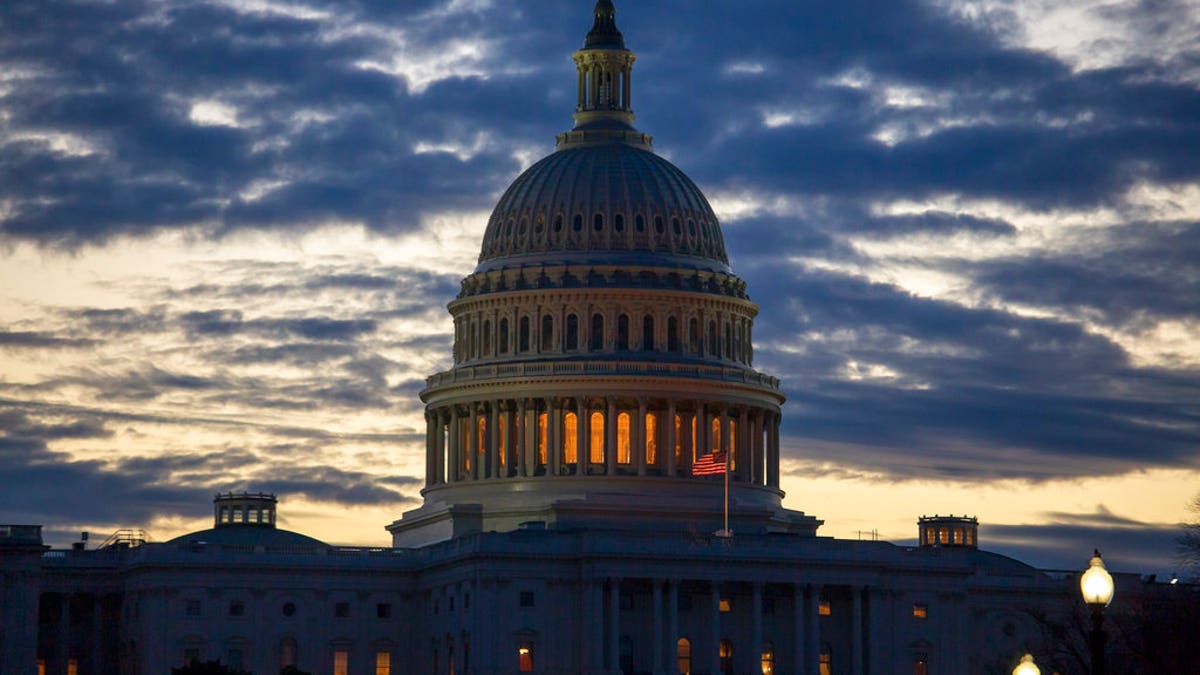 Dawn arrives at the Capitol in Washington, as the partial government shutdown enters day 18, Tuesday, Jan. 8, 2019, as President Donald Trump holds to his border wall funding demands. Trump will speak to the nation tonight about the border in a televised address from the Oval Office. (AP Photo/J. Scott Applewhite)