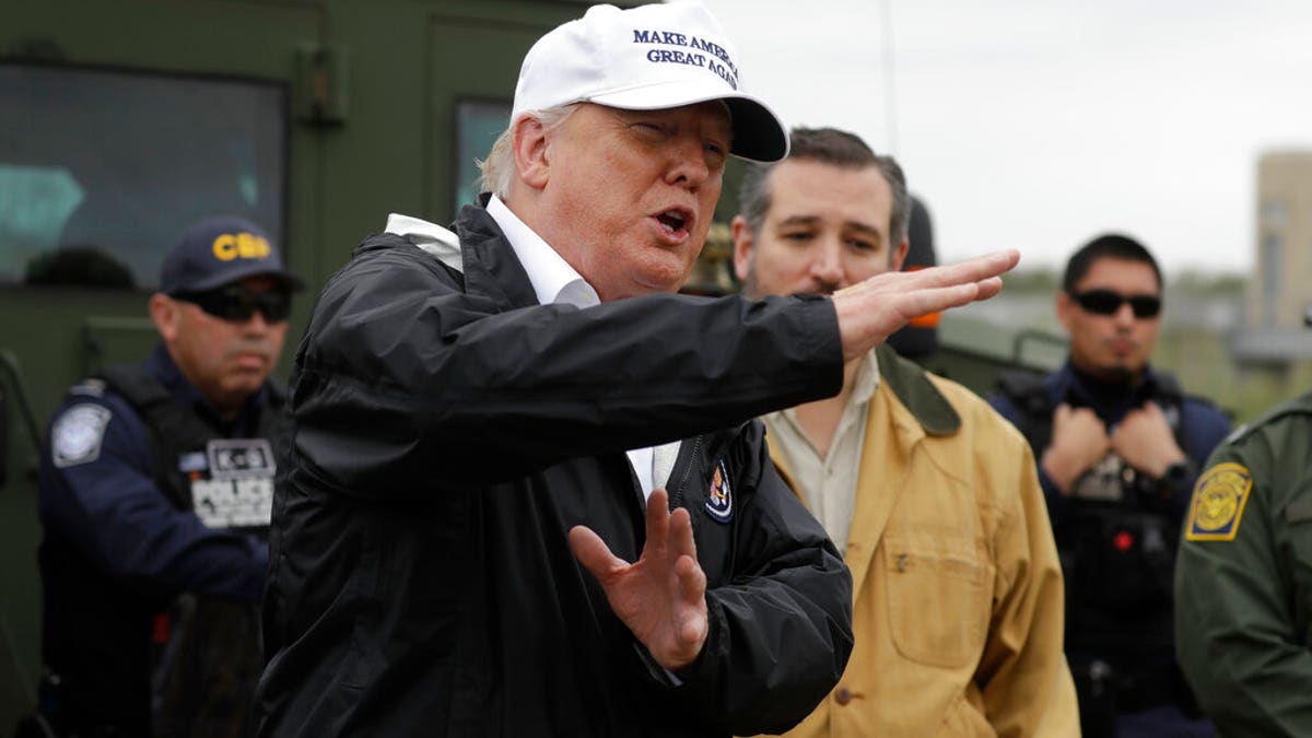 President Donald Trump speaking at the U.S. border with Mexico at the Rio Grande on the southern border Thursday as Sen. Ted Cruz, R-Texas, listened. (AP Photo/ Evan Vucci)