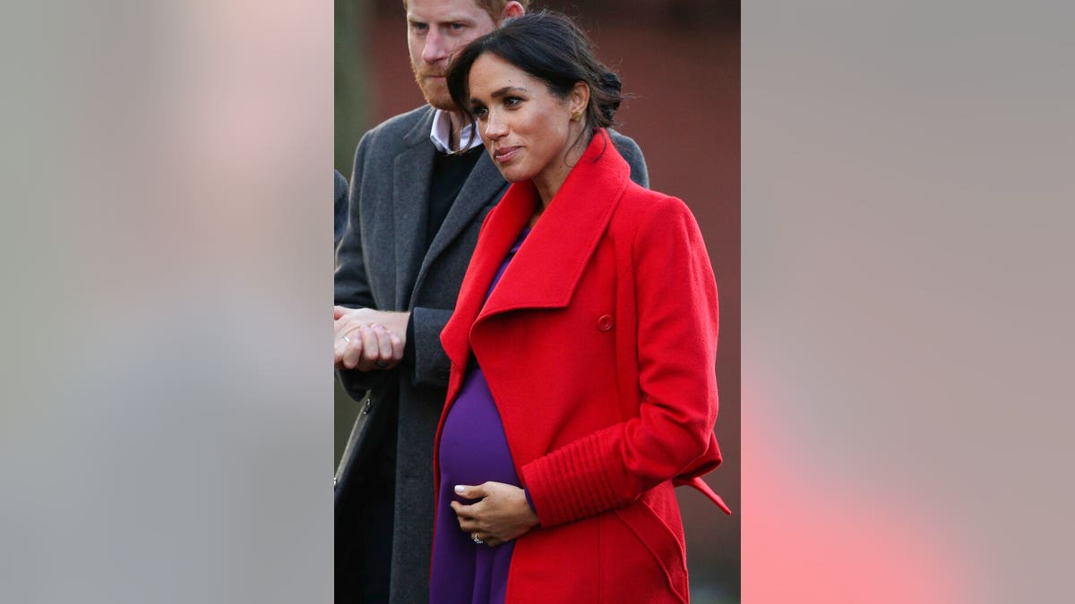 Meghan, the Duchess of Sussex and Britain's Prince Harry visit a new sculpture in Hamilton Square to mark the 100th anniversary of war poet Wilfred Owen's death, during a visit to Birkenhead, England.