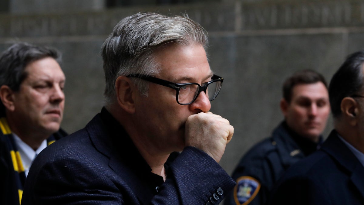Actor Alec Baldwin leaves a New York City court, Wednesday, Jan. 23, 2019, after a hearing on charges that he slugged a man during a dispute over a parking spot last fall.