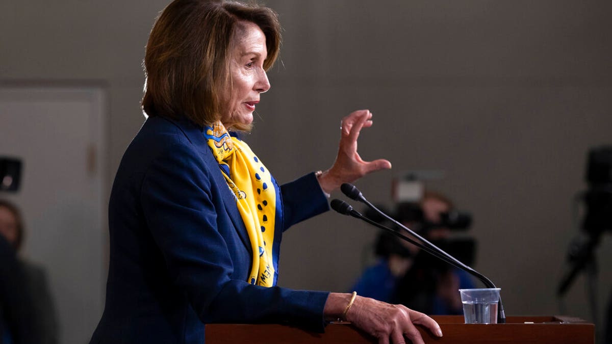 Speaker of the House Nancy Pelosi, D-Calif., talks to reporters a day after officially postponing President Donald Trump's State of the Union address until the government is fully reopened, at the Capitol on Thursday. (AP Photo/J. Scott Applewhite)