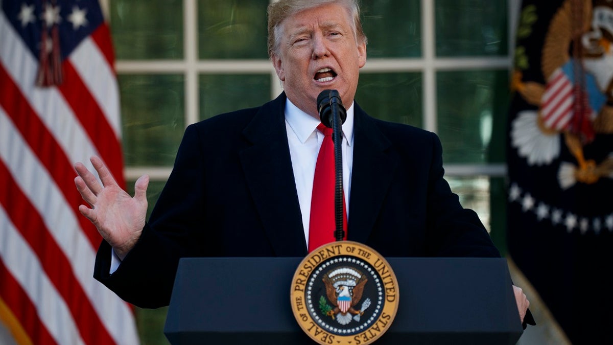 President Donald Trump announces a deal to temporarily reopen the government, in the Rose Garden of the White House, Friday, Jan. 25, 2019, in Washington. (Associated Press)
