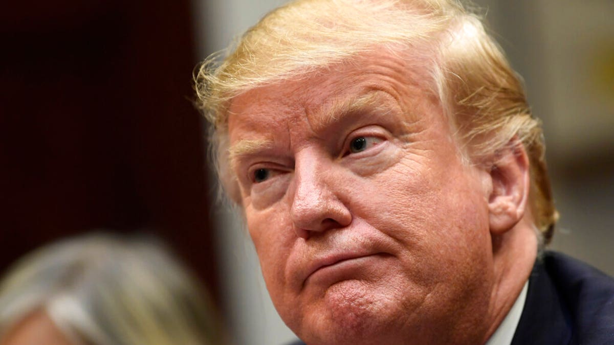President Donald Trump listens during a meeting with Hispanic pastors in the Roosevelt Room of the White House in Washington, Friday, Jan. 25, 2019.