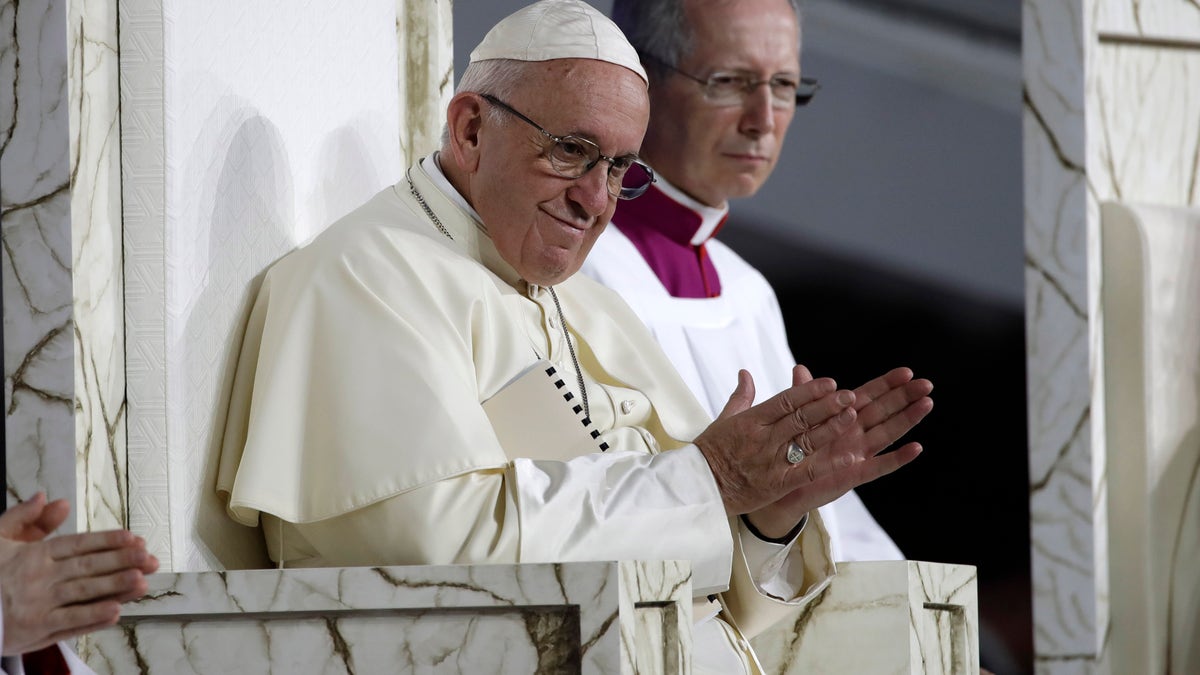 Hundreds of thousands of people camped out overnight in the Campo San Juan Pablo II following a Saturday evening mass, eagerly awaiting the pope's arrival early on Sunday morning