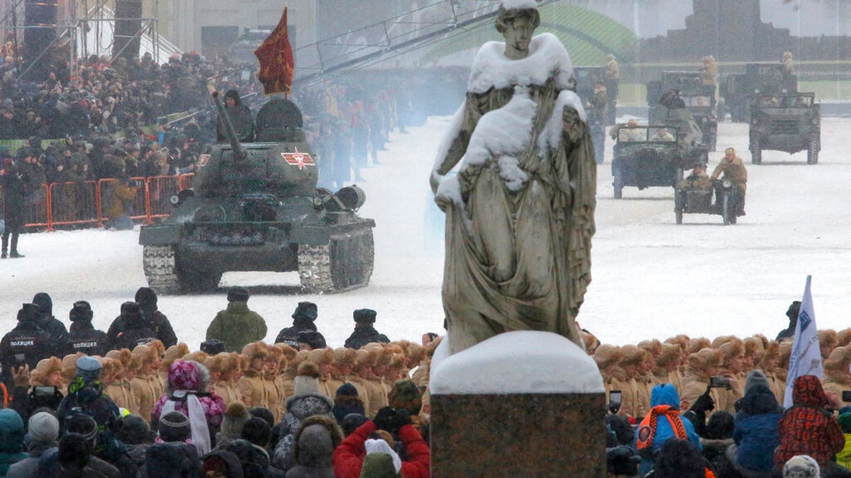 A Soviet World War II T-34 tank drives during a military parade at Dvortsovaya (Palace) Square during the celebration of the 75th anniversary of the end of the Siege of Leningrad during World War II in St.Petersburg, Russia, Sunday, Jan. 27, 2019.