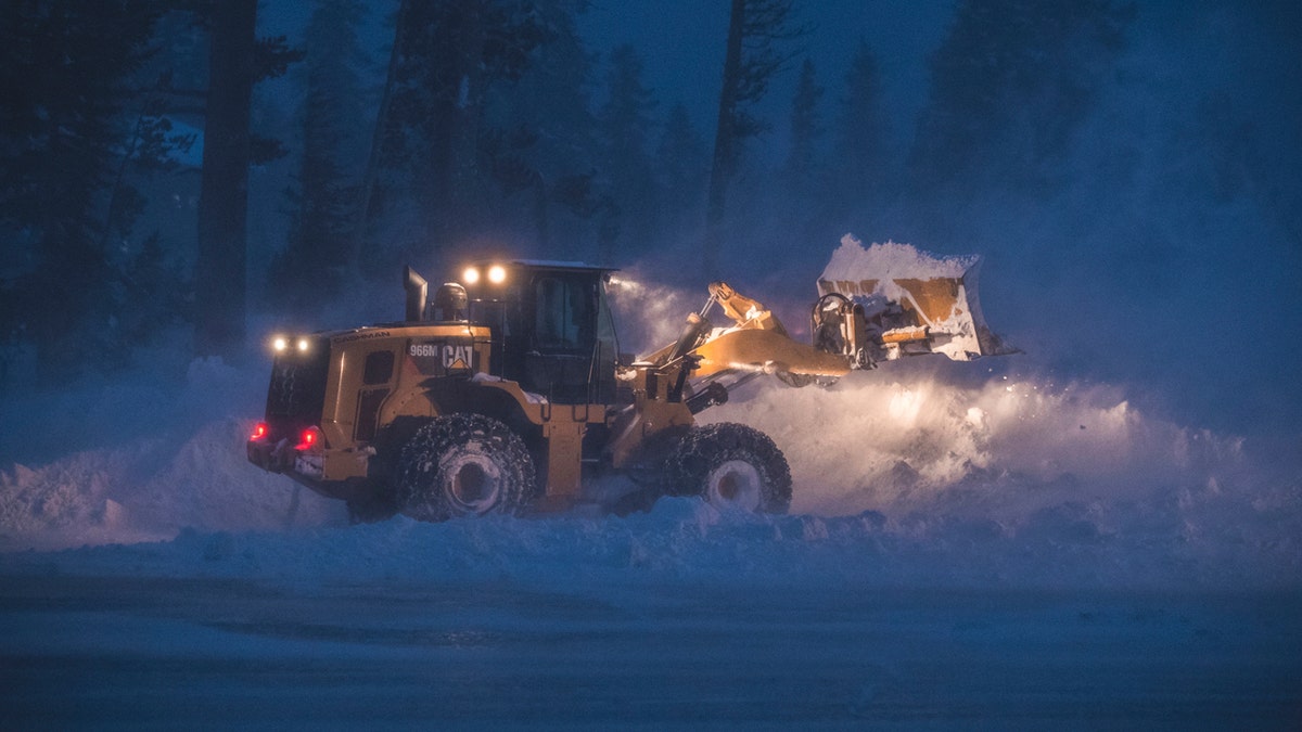 This photo provided by Mammoth Mountain Ski Area shows crew clearing fresh snow fall at Mammoth Mountain ski area, in Mammoth Lakes, Calif., Wednesday, Jan. 16, 2019.
