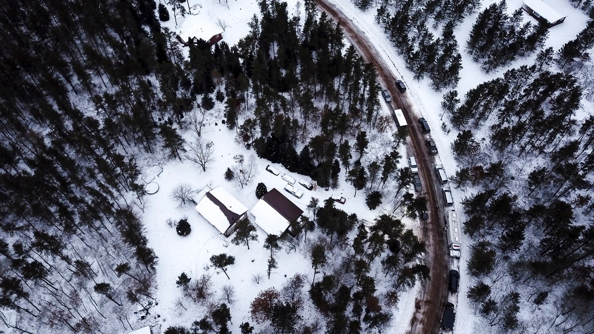 This aerial photo shows the cabin where 13-year-old Jayme Closs was held by Jake Thomas Patterson, is surrounded by law enforcement vehicles, Saturday, Jan. 12, 2019 in the town Gordon, Wis.