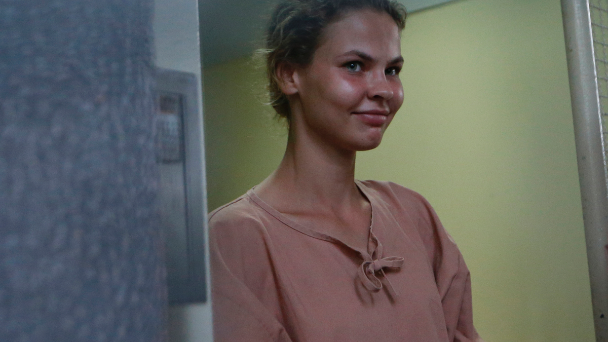 In this Monday, Aug. 20, 2018, file photo, Anastasia Vashukevich, leaves the Pattaya Provincial Court in Chonburi province, Thailand. A model from Belarus who claimed last year that she had evidence of Russian involvement in helping elect Donald Trump president has pleaded guilty in a Thai court in a case related to holding a sex training seminar and will be deported. A lawyer representing Anastasia Vashukevich said she and seven co-defendants would be freed Tuesday Jan. 15, 2019, and deported. (AP Photo/Sakchai Lalit, File)