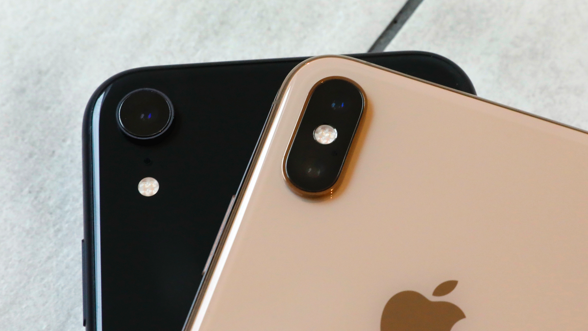 FILE- This Oct. 22, 2018, file photo shows the iPhone XR, left, that has a single lens, and the iPhone XS Max that has two lenses, in New York.(AP Photo/Richard Drew, File)
