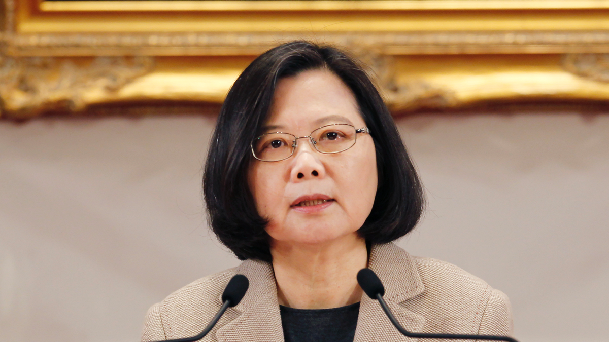 President Tsai Ing-wen of Taiwan speaks at news conference in a tan suit