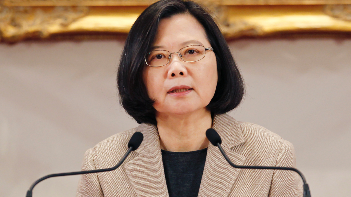 President Tsai Ing-wen of Taiwan speaks at news conference in a tan suit