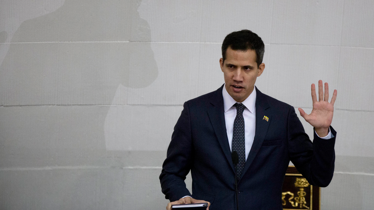 FILE - Venezuelan lawmaker Juan Guaido takes the oath of office as president of the National Assembly in Caracas, Venezuela. A coalition of Latin American governments that joined the U.S. in quickly recognizing Guaido as Venezuela’s interim president, and not Nicolas Maduro, came together during weeks of secret diplomacy. (AP Photo/Fernando Llano, File)