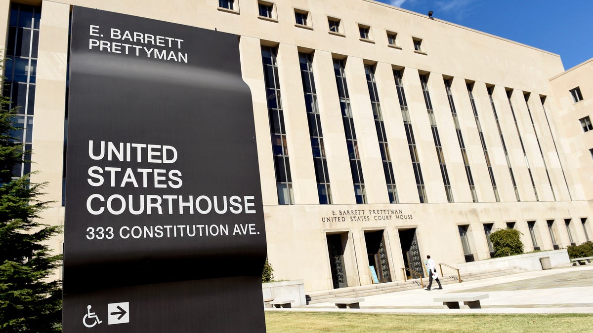 FILE - In this Sept. 22, 2014, file photo, a view of the E. Barrett Prettyman U.S. Courthouse in Washington. The American Civil Liberties Union is suing the Trump administration, claiming it is violating immigration laws and its own policies by detaining immigrants who have a solid case for seeking asylum in the United States. The ACLU said it was filing a lawsuit Thursday in U.S. District Court in Washington claiming that the Immigration and Customs Enforcement agency is detaining many asylum seekers for months while they await hearings before an immigration judge. (AP Photo/Susan Walsh, File)