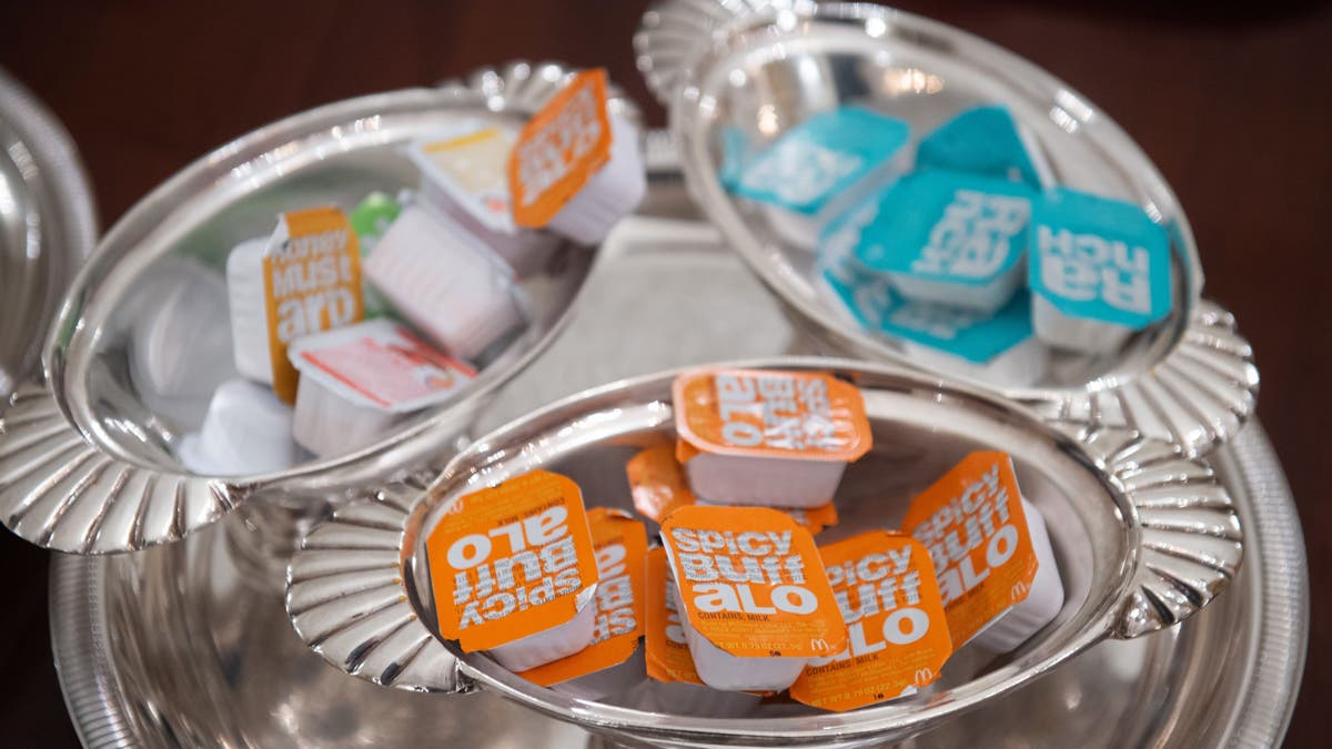 Dipping sauces placed in silver trays accompany some of the fast food President Trump purchased for a ceremony honoring the 2018 College Football Playoff National Champion Clemson Tigers.