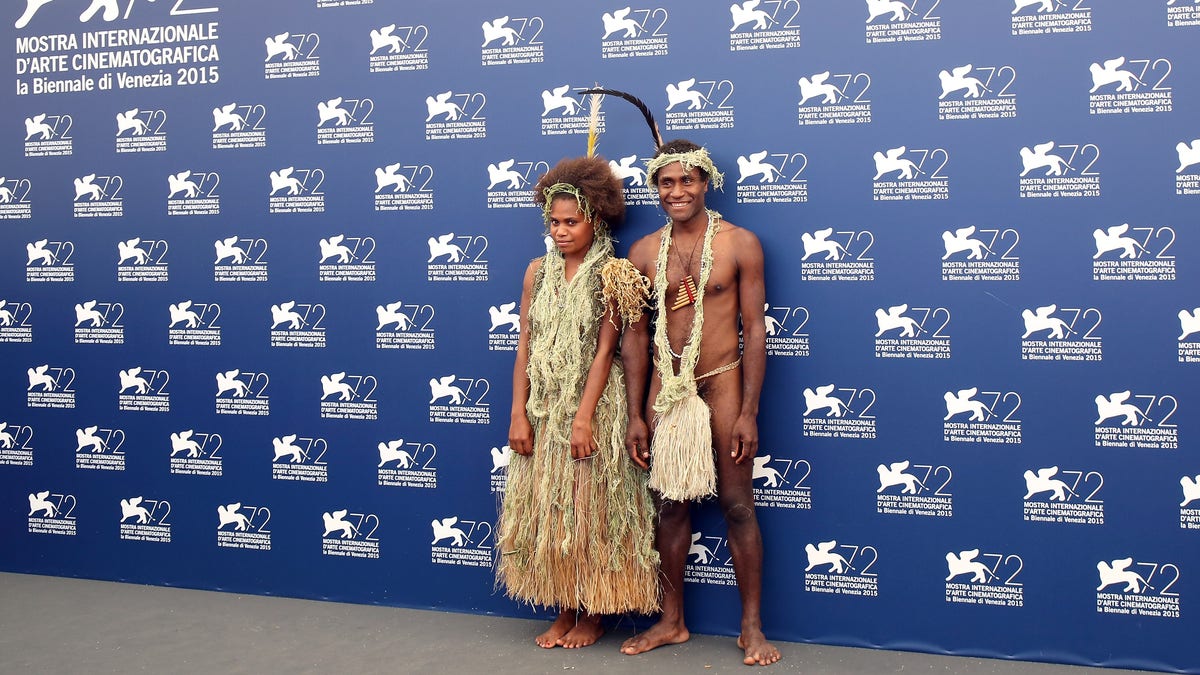 VENICE, ITALY - SEPTEMBER 08: (L-R) Marie Wawa and Mungau Dain attend a photocall for 'Tanna' during the 72nd Venice Film Festival at Palazzo del Casino on September 8, 2015 in Venice, Italy.