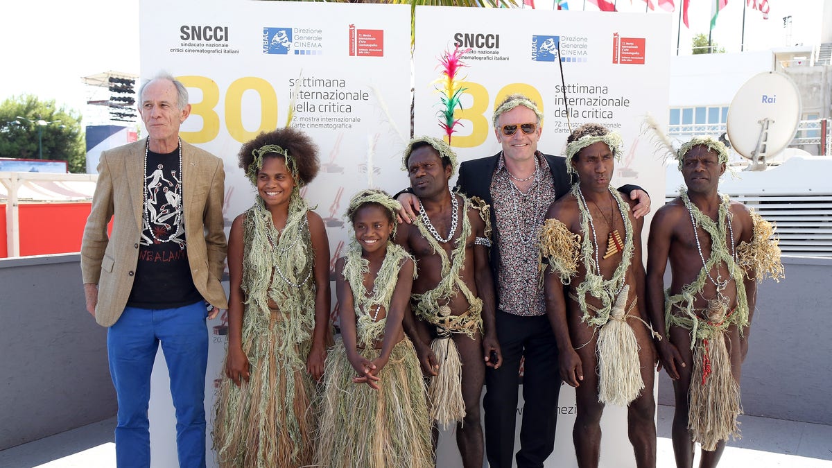 (L-R) Director Martin Butler, Marie Wawa, Marceline Rofit, Lingai Kowia, director Bentley Dean, Mungau Dain and Jimmy Jospeh Nako attend a photocall for 'Tanna' during the 72nd Venice Film Festival. It was reported that Dain has died.