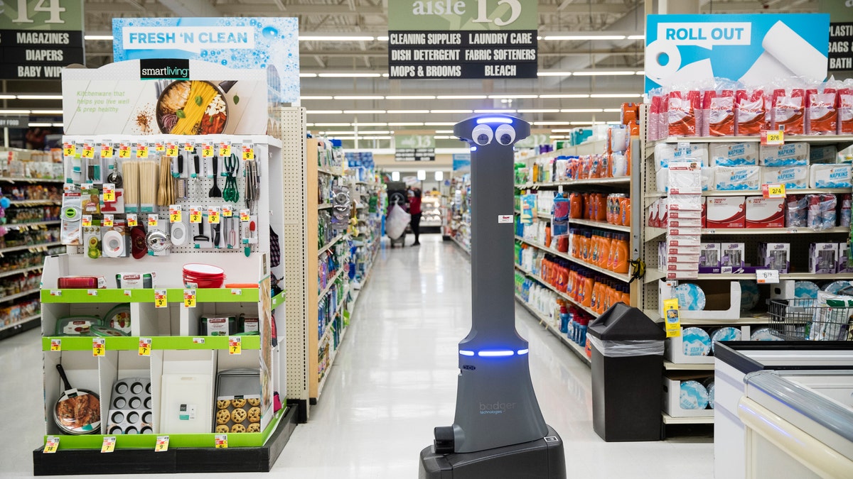 A robot named Marty cleans the floors at a Giant grocery store in Harrisburg, Pa., Tuesday, Jan. 15, 2019.