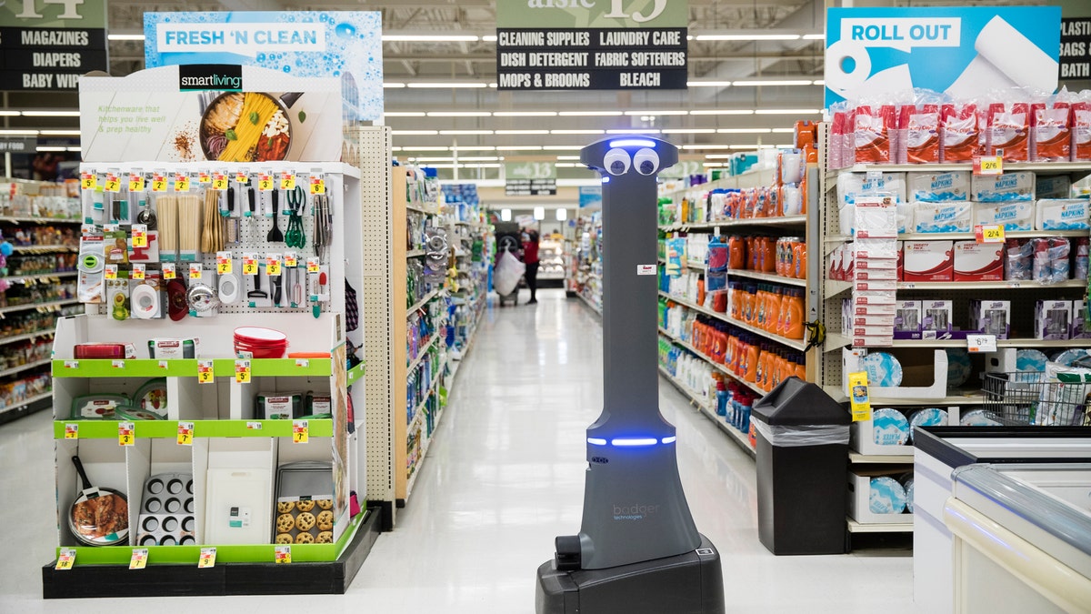 A robot named Marty cleans the floors at a Giant grocery store in Harrisburg, Pa., Tuesday, Jan. 15, 2019.
