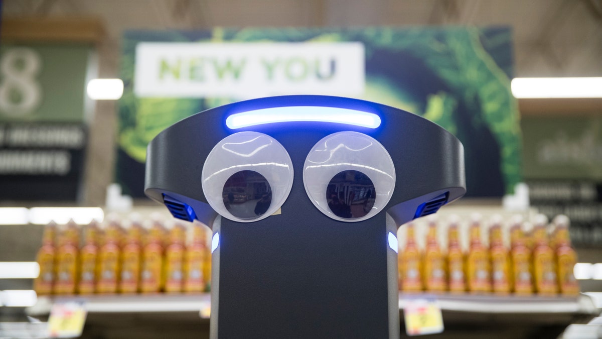 A robot named Marty cleans the floors at a Giant grocery store in Harrisburg, Pa., Tuesday, Jan. 15, 2019. (AP Photo/Matt Rourke)