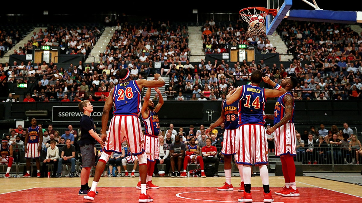 A spectator gets involved during The Original Harlem Globetrotters Tour at The SSE Arena, London. (Photo by Steven Paston/PA Images via Getty Images)