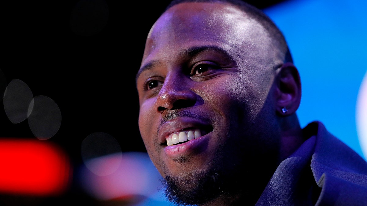 ATLANTA, GEORGIA - JANUARY 28: James White #28 of the New England Patriots talks to the media during Super Bowl LIII Opening Night at State Farm Arena on January 28, 2019 in Atlanta, Georgia.