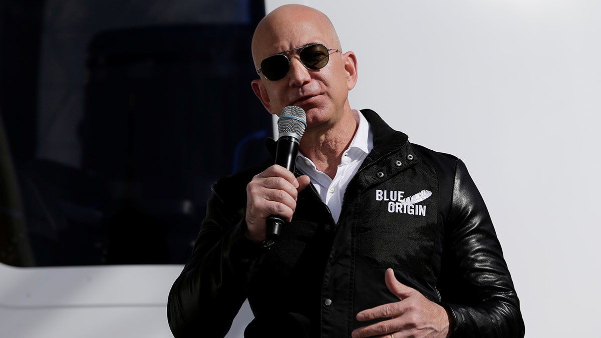 File photo :Amazon and Blue Origin founder Jeff Bezos addresses the media about the New Shepard rocket booster and Crew Capsule mockup at the 33rd Space Symposium in Colorado Springs, Colorado, United States April 5, 2017. REUTERS/Isaiah J. Downing -