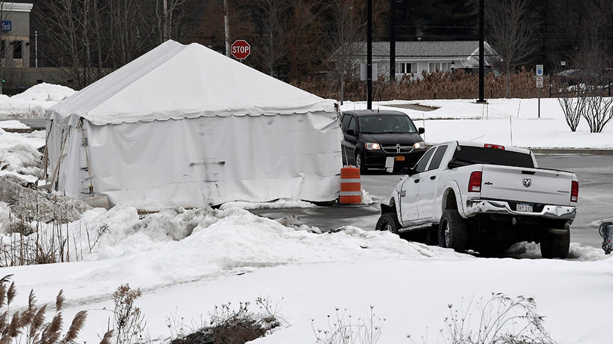 View of tent structure housing the wrecked limousine owned by Prestige Limousine that was involved in a fatal crash on Oct. 6,  The accident, in Schoharie County, New York, killed 20 people and remained in place behind the state police headquarters in Latham, on Tuesday. (AP Photo/Hans Pennink)