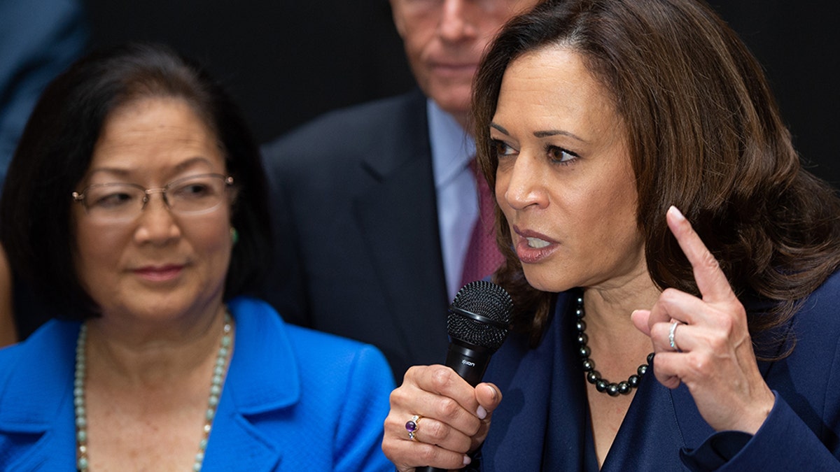 U.S. Senator Kamala Harris (R), Democrat from California, U.S. Senator Mazie Hirono (L).  (Photo credit should read SAUL LOEB/AFP/Getty Images)