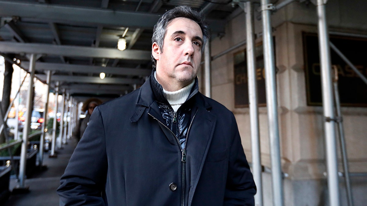 FILE - In this Dec. 7, 2018 file photo, Michael Cohen, former lawyer to President Donald Trump, leaves his apartment building in New York. A report by BuzzFeed News, citing two unnamed law enforcement officials, says that Trump directed Cohen to lie to Congress and that Cohen regularly briefed Trump on the project. The Associated Press has not independently confirmed the report. (AP Photo/Richard Drew, File)