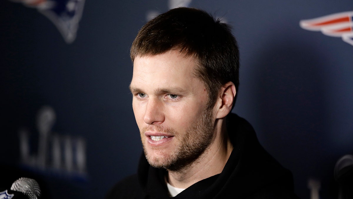 New England Patriots' Tom Brady speaks with members of the media during a news conference Tuesday, Jan. 29, 2019, ahead of the NFL Super Bowl 53 football game against Los Angeles Rams in Atlanta.