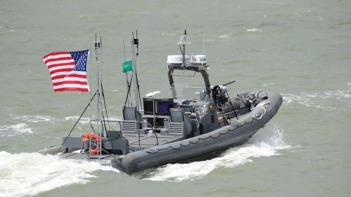 An unmanned 11-meter rigid-hull inflatable boat from Naval Surface Warfare Center Carderock on the James River in Newport News, Va.