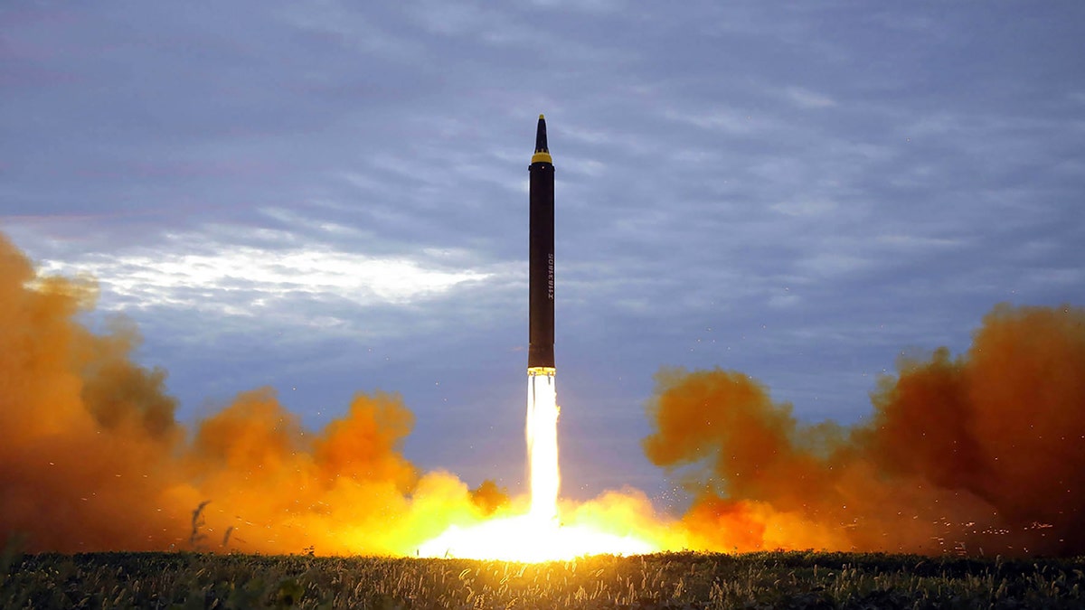 This picture from North Korea's official Korean Central News Agency (KCNA) taken on August 29, 2017 and released on August 30, 2017 shows North Korea's intermediate-range strategic ballistic rocket Hwasong-12 lifting off from the launching pad at an undisclosed location near Pyongyang. (Photo credit STR/AFP/Getty Images)