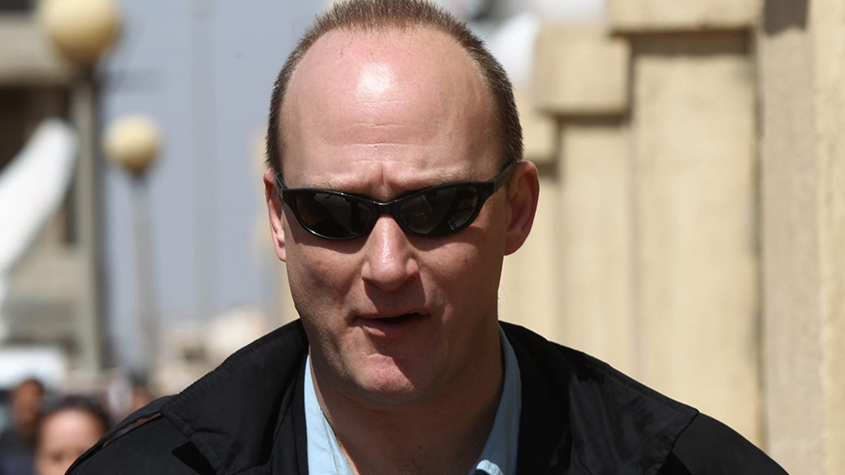 Robert Becker, who was the Iowa state director for Sen. Bernie Sanders' 2016 presidential bid, has been accused of forcibly kissing a younger female subordinate during the campaign.