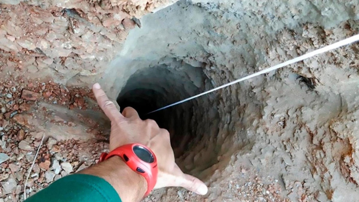 Two-year-old Yulen Garcia fell down this narrow well on Sunday afternoon in southern Spain