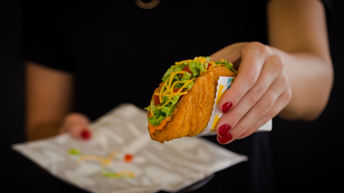 The fast food chain is announcing its newest product launch in a very cheesy way.
