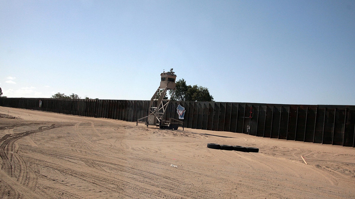 An observation tower rests near the border fence at the Yuma Border Sector on the US/Mexico border in San Luis, Arizona.