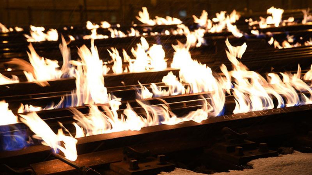 Chicago commuter railroad Metra says it uses flames from gas-fed heaters to warm the metal until it expands so rails don't break apart in the cold.