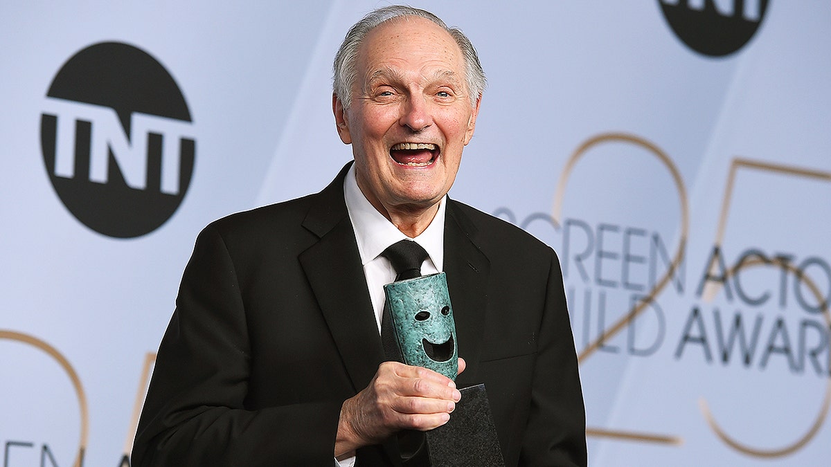 Alan Alda poses with the Life Achievement Award in the press room at the 25th annual Screen Actors Guild Awards at the Shrine Auditorium & Expo Hall on Sunday, Jan. 27, 2019, in Los Angeles. (Photo by Jordan Strauss/Invision/AP)