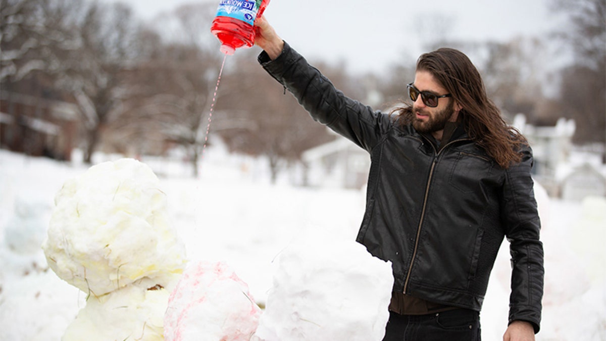 The herd of snowmen, which were colored red, blue and yellow, soon morphed into “a pop-up art installation” as people in the area learned about them, the university said. Paul has named the collection “Love Army.”