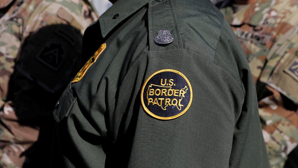 A U.S. Border Patrol patch on the sleeve of an official