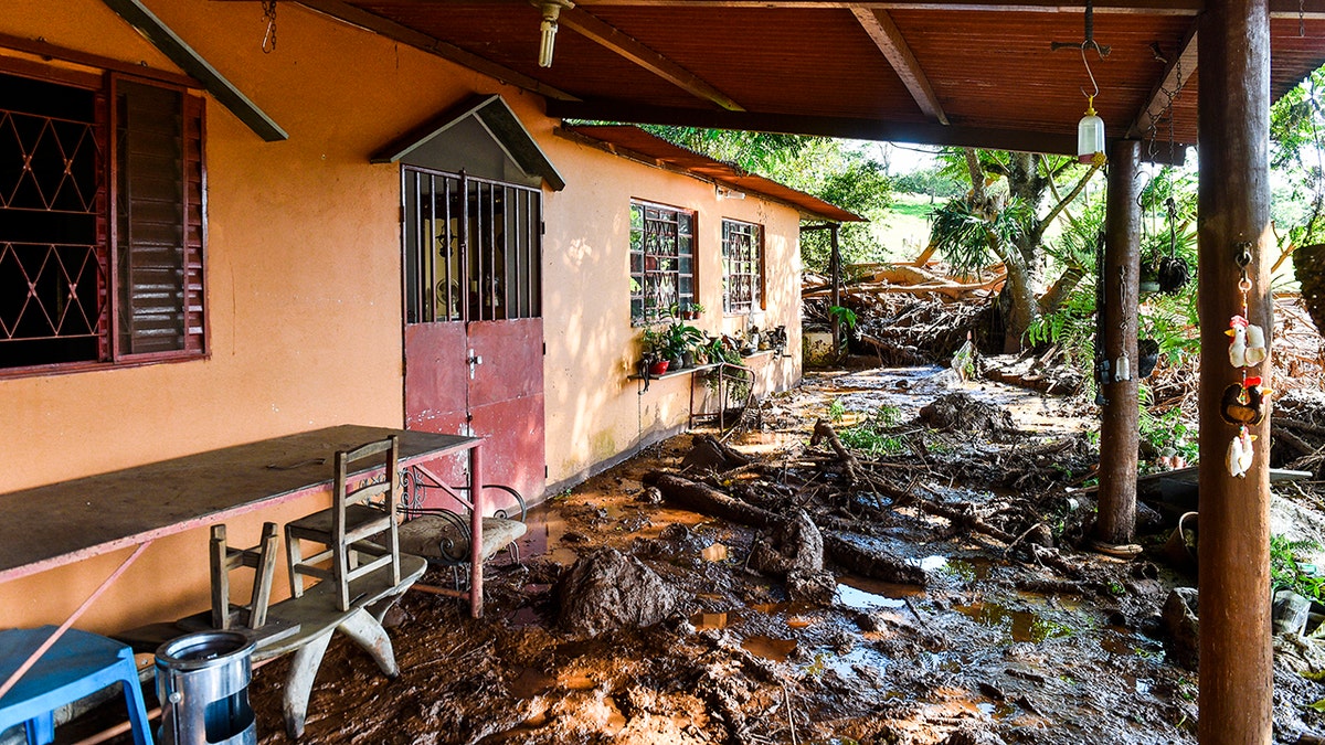 A house struck by the mud in southeastern Brazil on Jan.27, a day after the dam collapse. (Photo by Pedro Vilela/Getty Images)